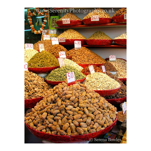 Jaggery and dried fruit attractively displayed. India.